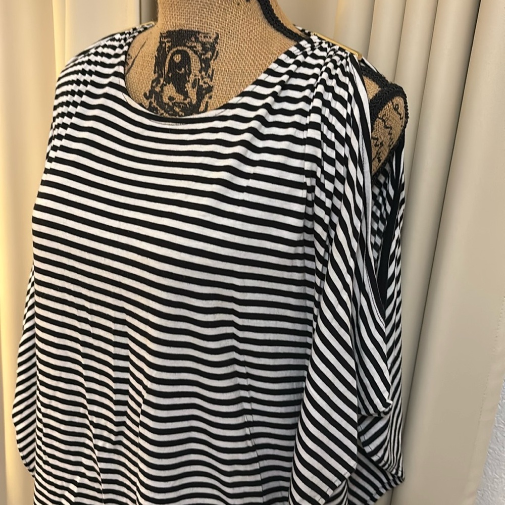 MK Black & White Cold Shoulder Top With Gold Logo Accents.